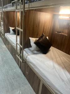 a row of bunk beds on a boat at Shiv ghar Stay in Varanasi