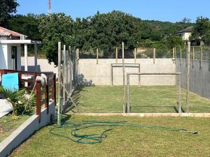 a yard with a volley ball hoop at Ponta Rest House in Lopes
