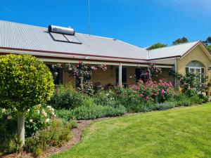 a house with a garden in front of it at Birchwood Gardens Bed and Breakfast in Narrikup