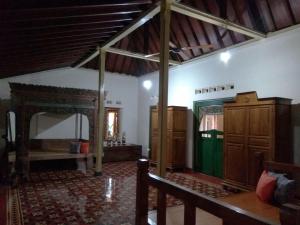 Voodi või voodid majutusasutuse Omah Pitoe Yogya Homestay toas