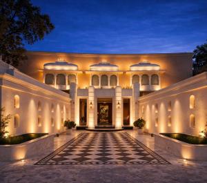 an exterior view of a building with a checkered floor at Chandralok - A Boutique Hotel in Udaipur Near Fateh Sagar Lake in Udaipur