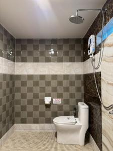 a bathroom with a toilet and a shower at Khaolak Nature House in Khao Lak +30 photos