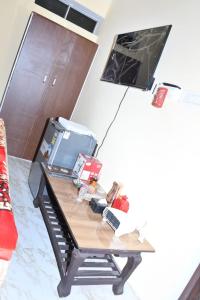 a coffee table in a living room with a table at Sarla Resort in Sawāi Mādhopur