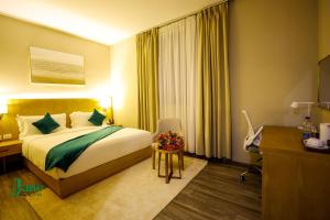 Llit o llits en una habitació de Jano Hotel 46 fotos més
