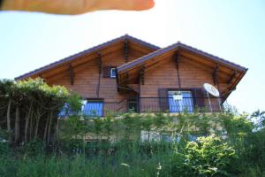 En hage utenfor Appartement 3 chambres dans un chalet