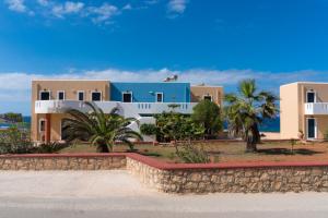 a view of a house from the street at Archipelagos Apartments in Arkasa