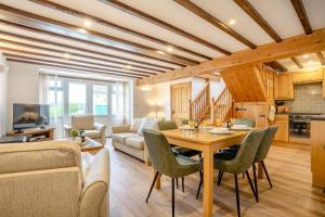 a kitchen and living room with a table and chairs at 2 Bed in Knayton oc-b35995 in Knapton