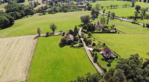 an aerial view of a house in a field at L'Oustal in Saint-Constant +19 photos