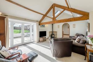 a living room with a couch and a tv at 1 Bed in Staxton oc-w36041 in Salton