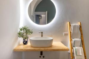 a bathroom with a white sink and a mirror at La Casita Ostuni - Authentic Apulian Stay in Ostuni +60 photos