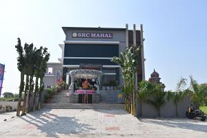 a store front of a building with a store at SRC Mahal in Killai