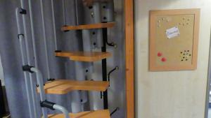 a room with a climbing wall and a climbing gym at Studio chez Nathalie & Eric in Mérignac +19 photos