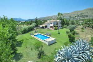 an aerial view of a house with a swimming pool at Villa Maina by Villa Plus in El Port