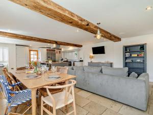 a living room with a couch and a table at 3 Bed in Harrogate oc-91269 in Summer Bridge