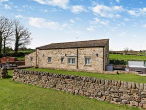 an old stone house behind a stone wall at 3 Bed in Harrogate oc-91269 in Summer Bridge