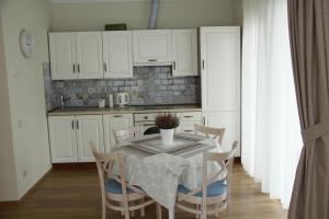 مطبخ أو مطبخ صغير في Full House Apartments