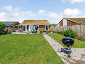 a barbecue in the backyard of a house at 3 Bed in Braunton oc-87699 in Braunton