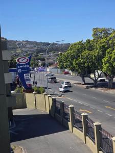 a view of a street with a car driving down a road at Elite Escape - 2 bedroom apartment in Avondale