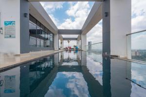 a swimming pool on the roof of a building at Lifestyle Studio Apartment Escada 101 with Balcony in Nairobi