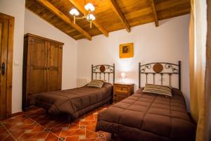 Postel nebo postele na pokoji v ubytování Cortijo Claudia + 43 fotografií