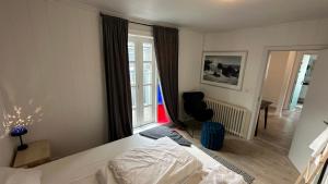 a hotel room with a bed and a window at The Viking s Haven - Heart of Downtown in Reykjavík