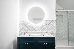 a bathroom with a sink and a mirror at No 4 The Halesworth in Halesworth +26 photos