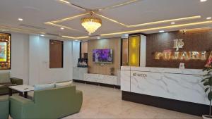 a lobby of a hotel with a waiting room at Hotel Pujari in Khātu