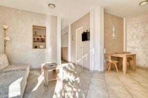 a living room with a couch and a table at Apartments Moskov in Kotor
