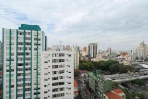 a view of a city with tall buildings at Condominio da Americas Maspex in São Paulo