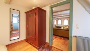 Ein Bett oder Betten in einem Zimmer der Unterkunft Altstadt Gästehaus Drewes Wale