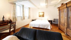 Ein Bett oder Betten in einem Zimmer der Unterkunft Altstadt Gästehaus Drewes Wale