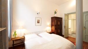 Ein Bett oder Betten in einem Zimmer der Unterkunft Altstadt Gästehaus Drewes Wale