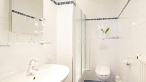 Ein Badezimmer in der Unterkunft Altstadt Gästehaus Drewes Wale