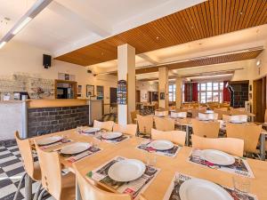 a large dining room with tables and chairs at Gîte Kaleo Han-Sur-Lesse in Han-sur-Lesse +31 photos
