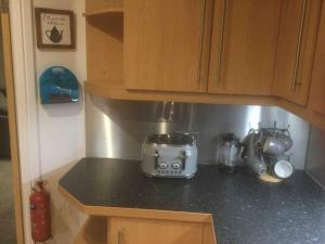 a kitchen counter with a toaster and a blender at Gorgeous Marina 2 Bed Apartment in Portishead