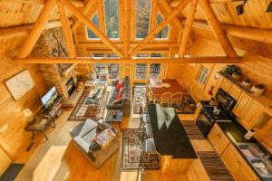 an overhead view of a living room in a log cabin at A Wispful Dream in McHenry