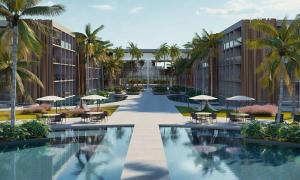 a resort with a pool and tables and umbrellas at Porto2life Máximo 6 pessoas in Porto De Galinhas