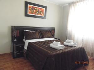 Кровать или кровати в номере B&B Cusing Wasi