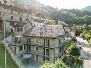 a group of buildings on a hill with a street at Casa Gemma in Rimella