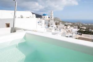 a view from the roof of a house with a swimming pool at Suntora in Pyrgos +8 photos