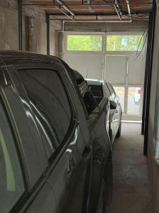 a couple of cars parked in a garage at Apart Sur Catriel in Catriel