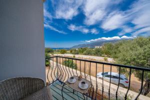 a balcony with a view of a car at Lacitrus Hotel & Villa in Kaş