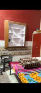 a pile of towels sitting on top of a table at Khanna Nagar GDA approved colony in Ghaziabad