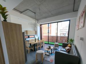 a living room with a couch and a table at Atom Cuatro 303 in Guatemala