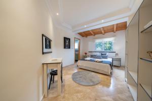 a living room with a bed and a table at Lacitrus Hotel & Villa in Kaş