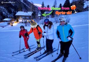 a group of people on skis in the snow at Landhaus Kaulfuss in Sankt Jakob in Defereggen