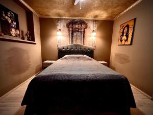 a bedroom with a large bed in a room at Traditional Narva House in Narva