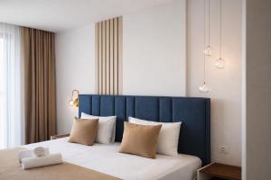 Ліжко або ліжка в номері Hotel Adler +21 фото