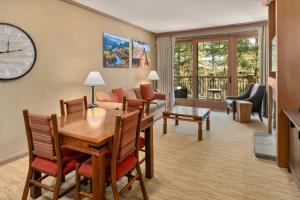 a living room with a table and a dining room at 2038 Warm Winter Retreat - Perfect Lodge Room in Cle Elum
