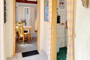 a room with a table and a dining room at Hibiskus in Lübbenau +16 photos